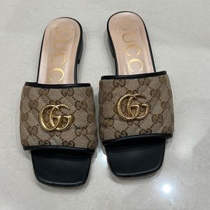 Gucci GG leather trimmed canvas slides